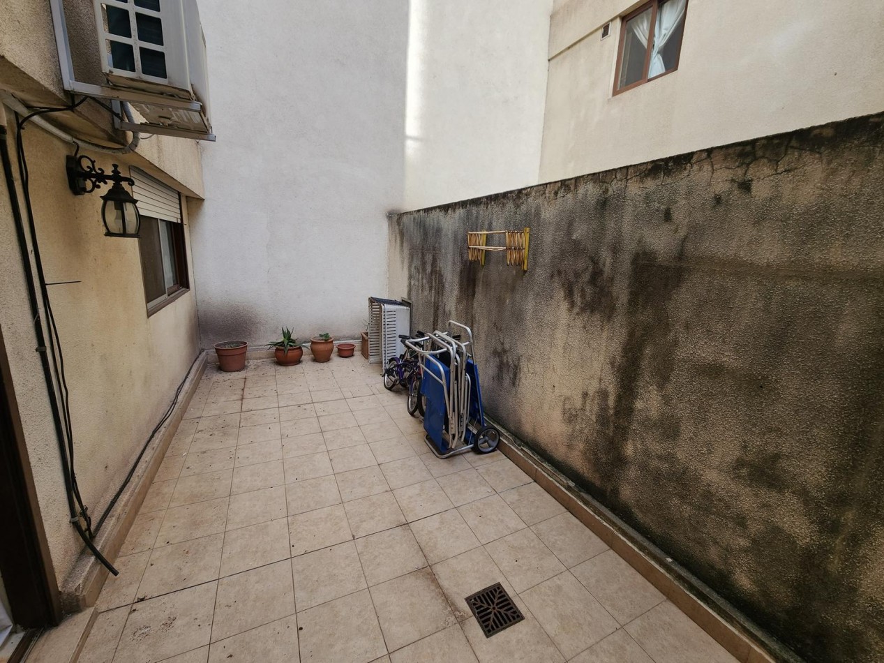 DEPARTAMENTO 2 DORMITORIOS CON PATIO, BALCON Y COCHERA - MACROCENTRO